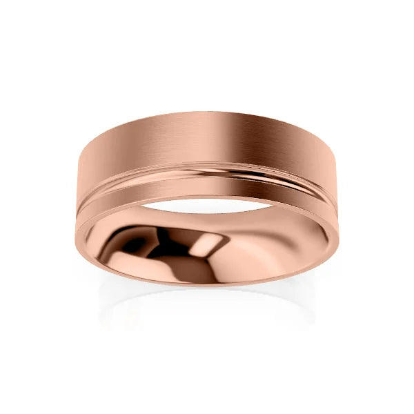 A rose gold wedding band with a matte finish and a single polished groove near the edge, on a white background.