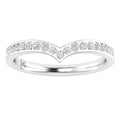 White gold chevron ring with a row of round diamonds set along the top curve of the band.