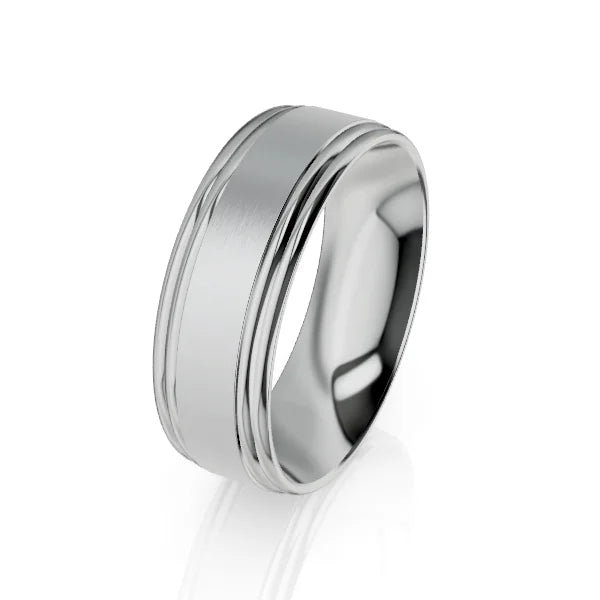 A polished silver ring with a brushed center band and shiny beveled edges, displayed on a white background.
