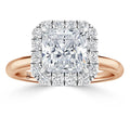 Rose gold ring with a large square diamond center, surrounded by a halo of smaller round diamonds.