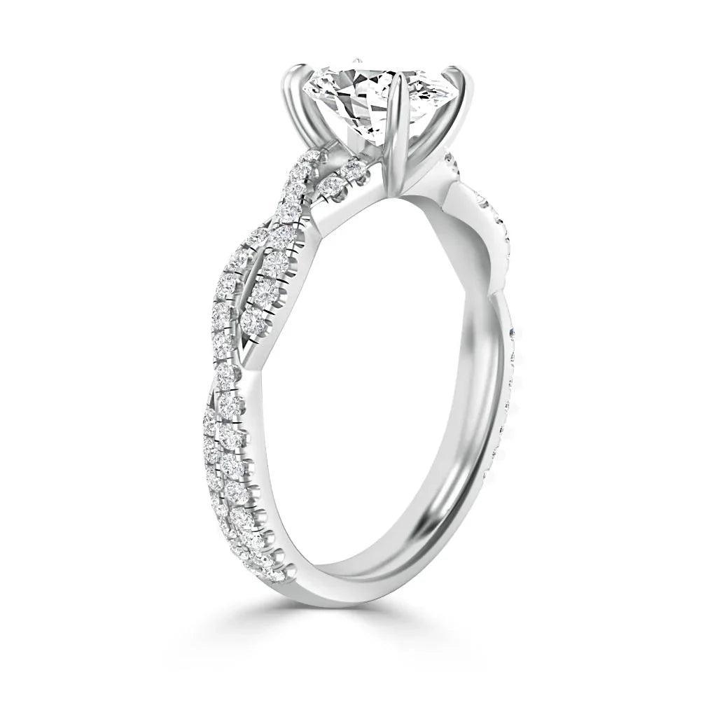 White gold ring with a large round diamond and twisting, pavé diamond-accented band, shown from the side.