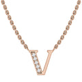 Rose gold chain necklace with a “V” pendant, half inlaid with small, sparkling white gemstones.