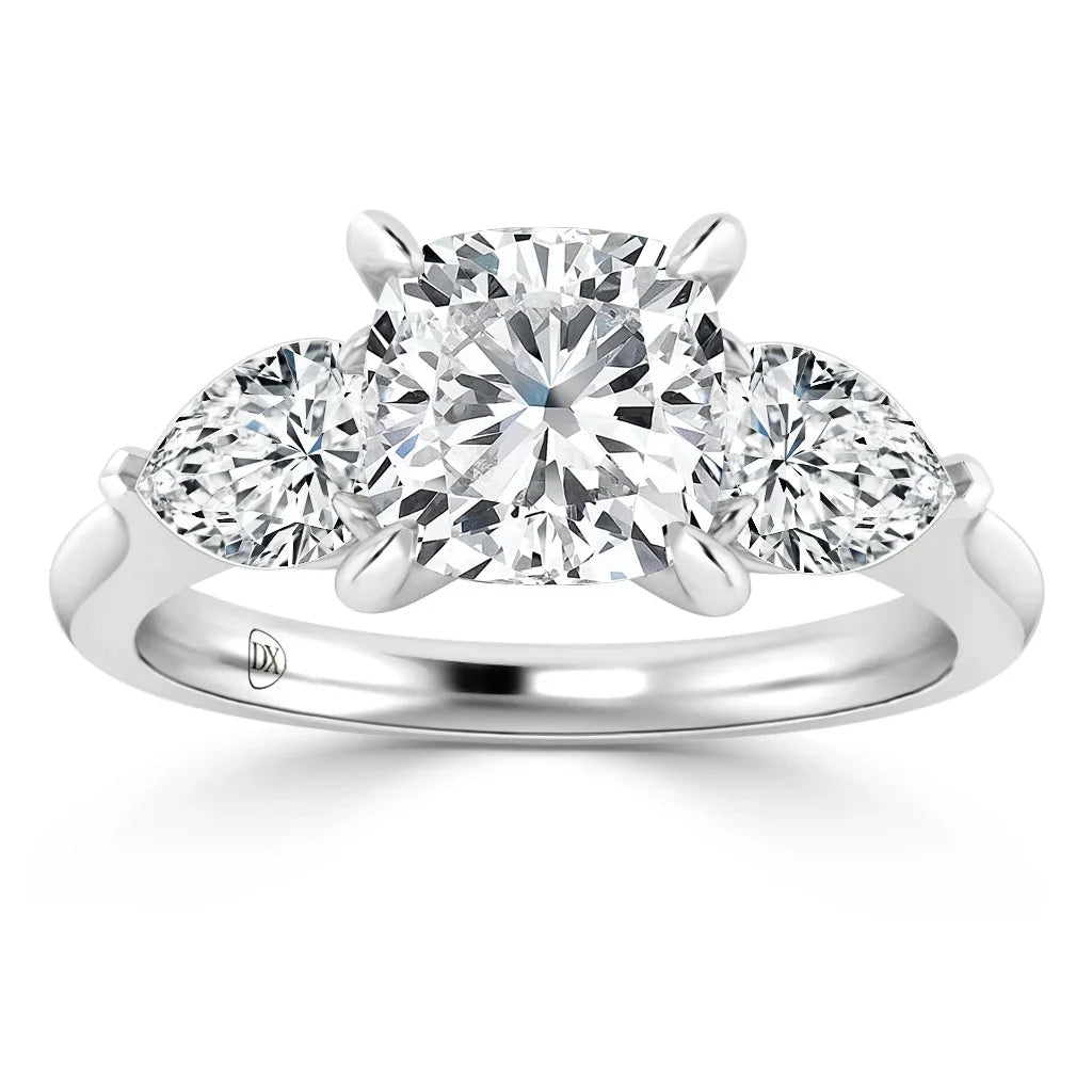 Platinum ring with a large round center diamond and two half-moon diamonds on each side.