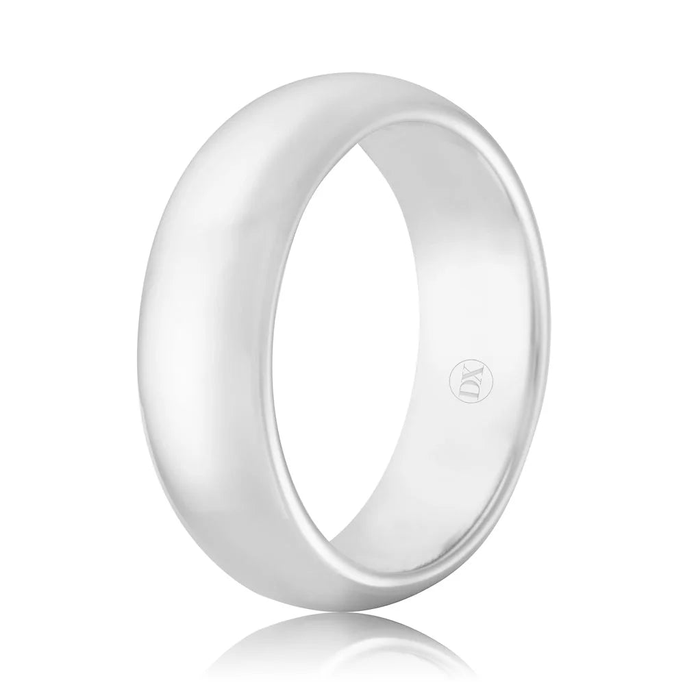 A plain, polished silver band ring with a smooth, rounded surface and a small engraved logo inside.