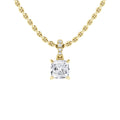 Gold chain necklace with a square-cut diamond pendant and small round diamonds above the main stone.