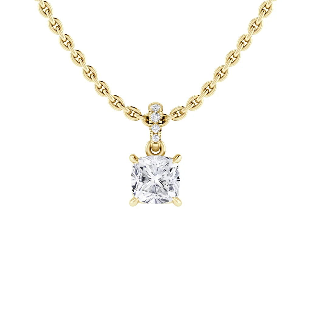Gold chain necklace with a square-cut diamond pendant and small round diamonds above the main stone.