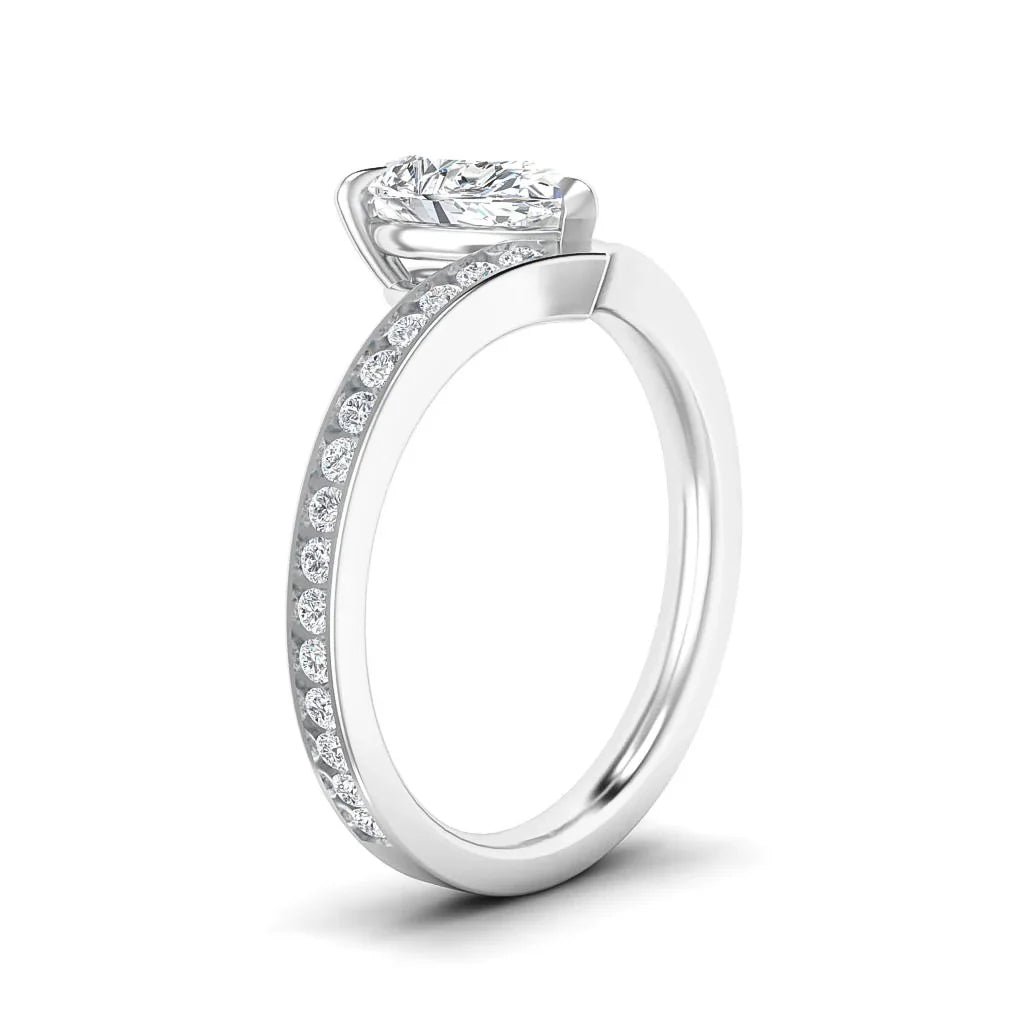 A silver ring with a large central diamond and small diamonds set along the upper band, on a white background.