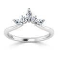 A white gold ring with three marquise and two round diamonds arranged in a crown-like cluster setting.