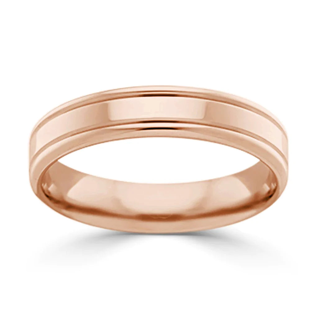 A plain rose gold wedding band with a polished finish and subtle raised edge detailing.