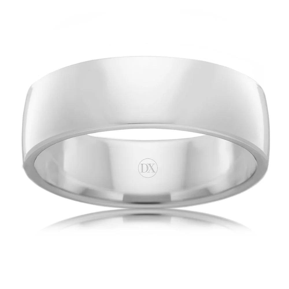 A plain, polished silver band ring with a smooth, flat surface and subtle engraved DX inside.