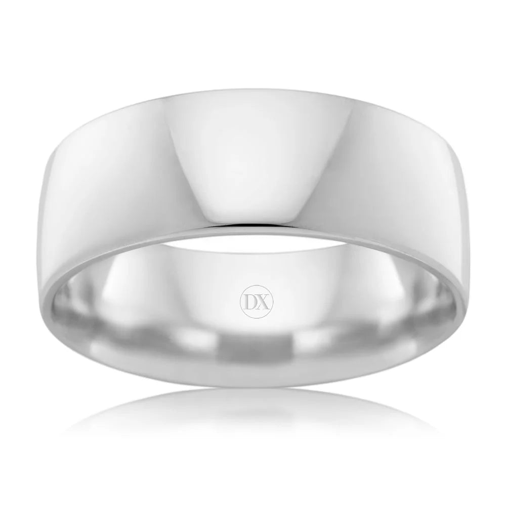 A plain, polished silver ring with a wide band shown against a white background.