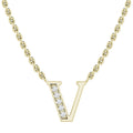 Gold chain necklace with a “V” pendant, half adorned with small sparkling diamonds, on a white background.