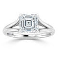 A solitaire engagement ring with an Asscher-cut diamond on a split shank platinum band.