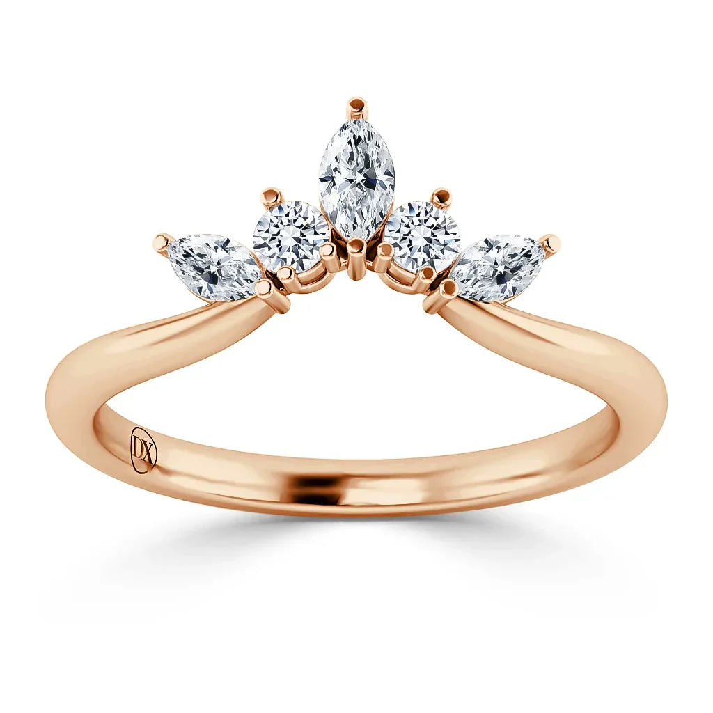 Rose gold ring with five white diamonds in varying shapes arranged in a crown-like cluster on top.