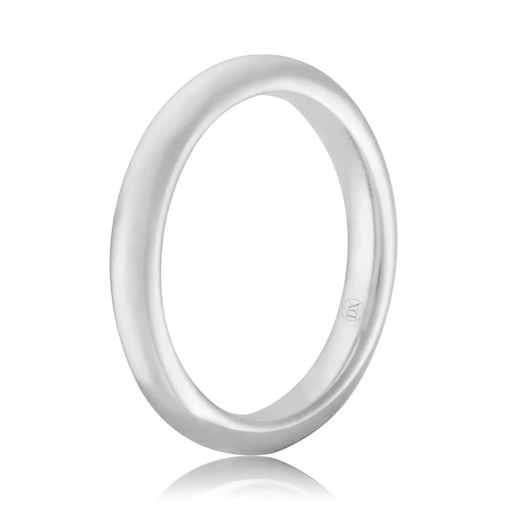 A simple, polished silver ring with a smooth, rounded band and a small engraved logo inside.
