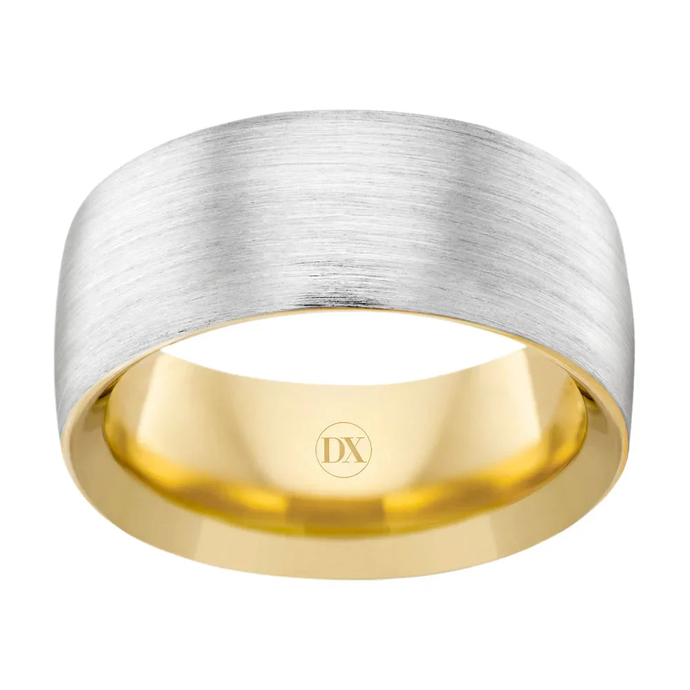 A gold ring with a matte silver brushed outer band and the initials DX engraved inside.