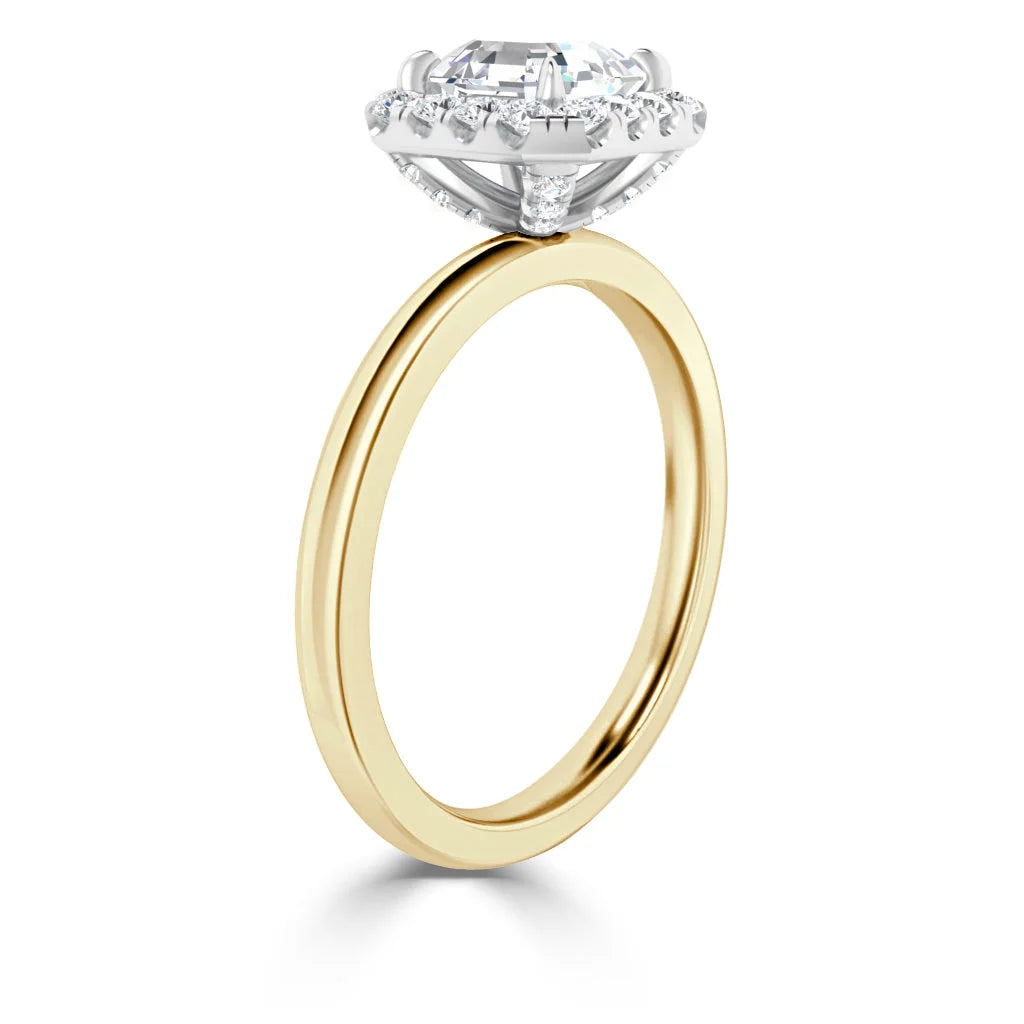 Gold band ring with a large round diamond solitaire in a high, prong-set setting seen from the side.