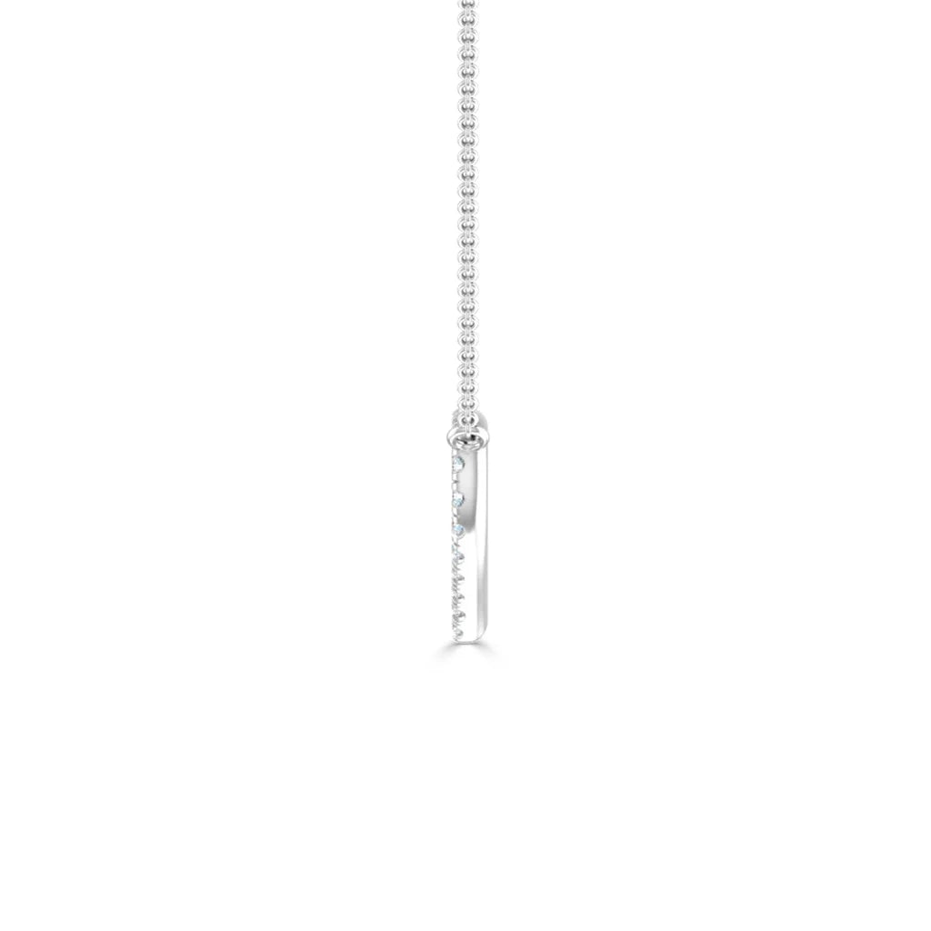 A thin silver pendant necklace with a vertical bar adorned with small sparkling stones, shown on a white background.