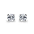 The Nora by DX Diamonds is a pair of solitaire earrings with lab-grown diamonds in 9ct white gold prongs, featuring round gemstones that exude timeless elegance and sophistication.