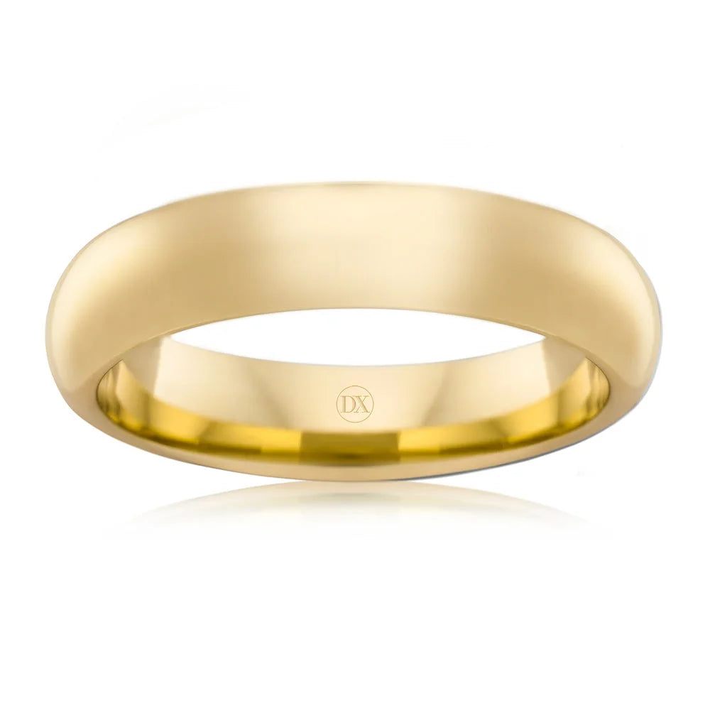 Simple polished gold wedding band ring with a smooth, rounded surface, shown against a white background.