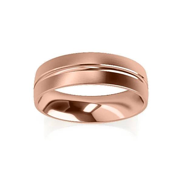 A rose gold ring with a matte finish and a diagonal groove detail, shown on a white background.