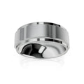 A wide, silver men’s ring with a brushed center and polished beveled edges on a white background.