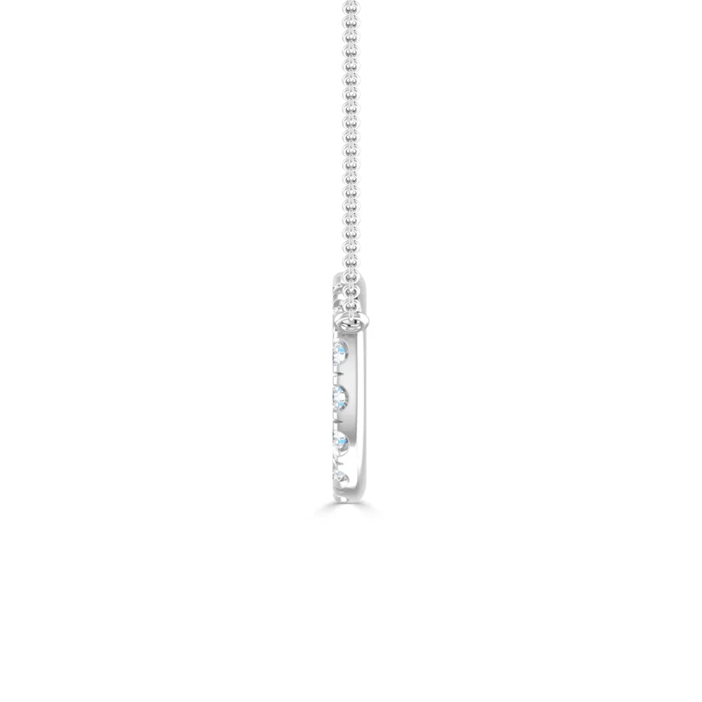 Side view of a thin silver pendant necklace with small embedded gemstones, shown on a white background.