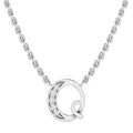 Silver necklace with a pendant shaped like the letter Q, partly encrusted with small sparkling crystals.