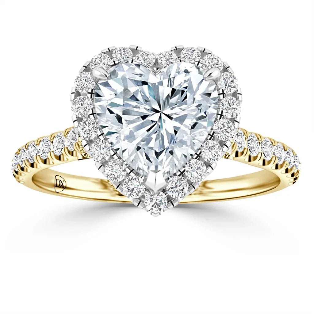 A gold ring with a heart-shaped diamond center, surrounded by smaller diamonds, on a diamond-studded band.