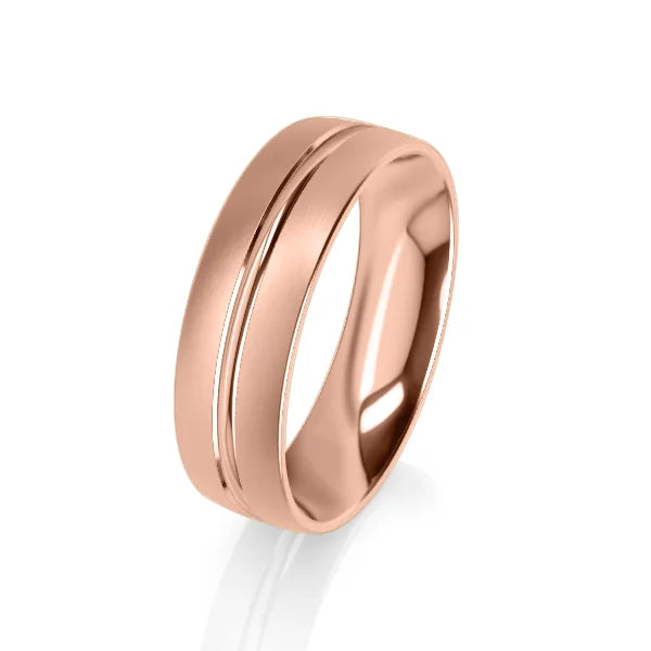 A rose gold ring with a single groove around the band, set against a white background.