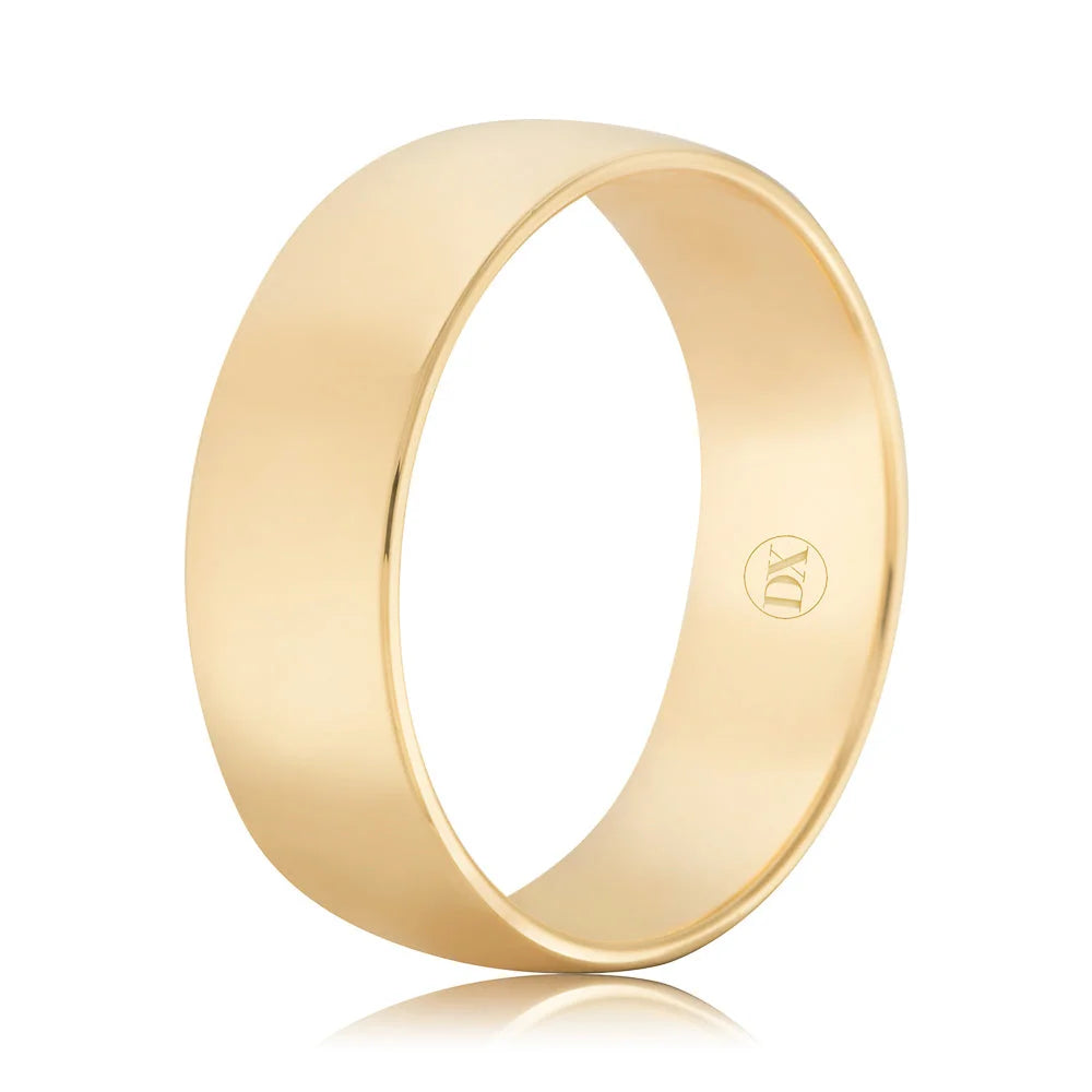 A plain, polished gold band ring with a small engraved logo on the inner surface, on a white background.