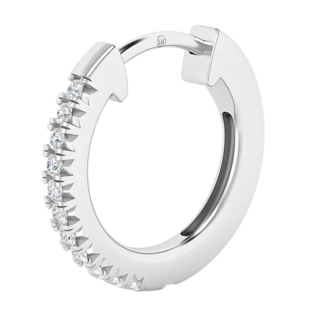 A silver hoop earring with a row of small, round white gemstones on the front half.