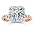 A rose gold ring with a large square diamond, halo setting, and pavé diamonds on the band.