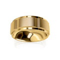 A wide, polished gold ring with a matte center band, displayed on a white background.