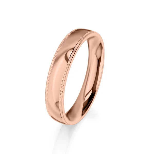 A shiny rose gold ring with smooth edges and a subtle, fine milgrain border on both sides.