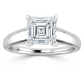 A platinum ring with a large, square Asscher-cut diamond set in a classic four-prong solitaire setting.