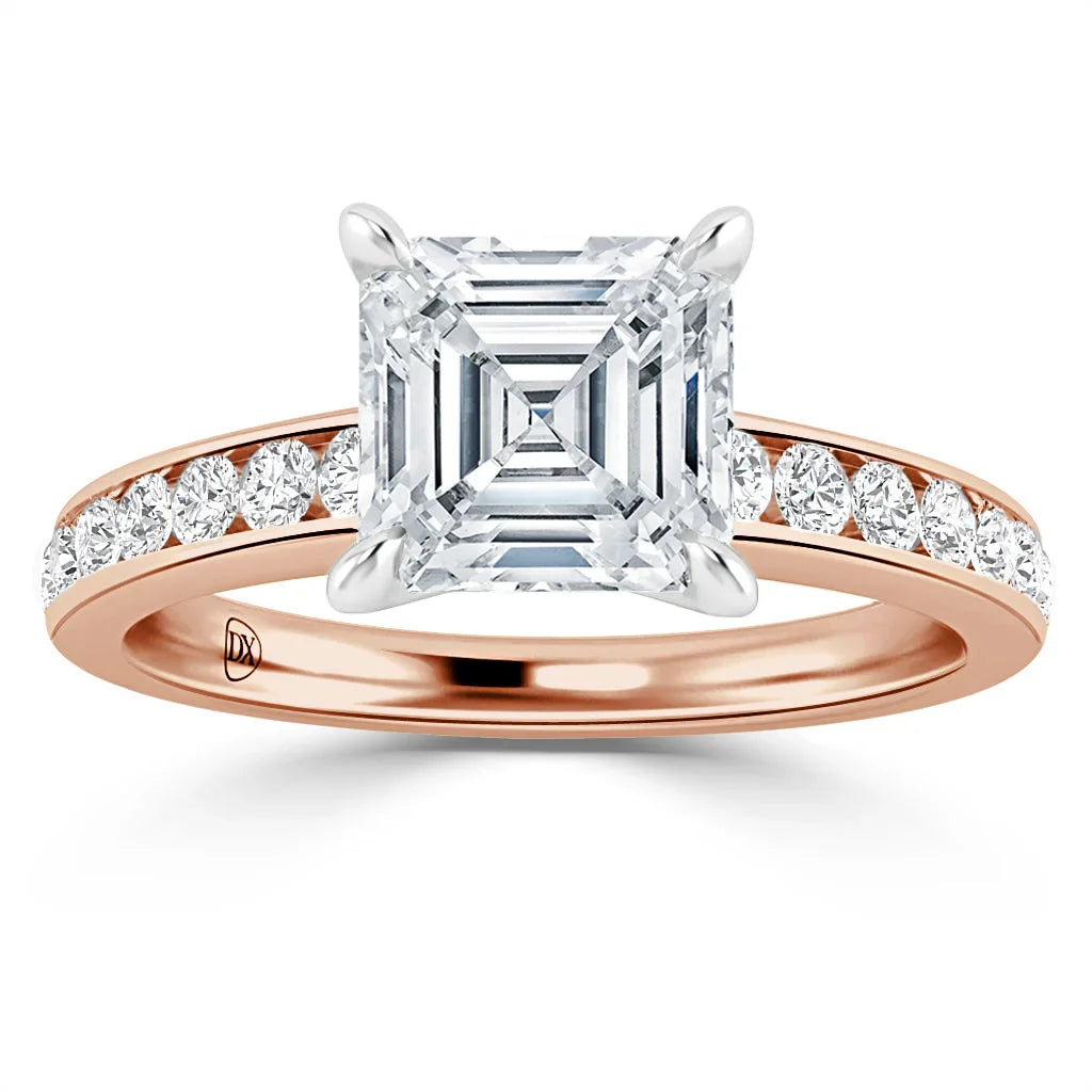 Rose gold ring with an Asscher-cut diamond center and round diamonds set along the band.